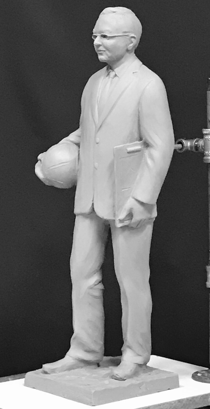 National Sculptors' Guild Fellow Gary Alsum has been selected to sculpt Gene Bess for placement at Three Rivers College in Poplar Bluff, Missouri. The school has been hard at work raising funds for this commemorative sculpture.  The bronze will be a life-sized standing figure depicting the coach with basketball in hand wearing his familiar suit and tie. The sculpture will be located on the entry plaza of the Libla Family Sports Center in 2022.  The former coach of the men's basketball team at Three Rivers Community College was hired in 1971.  ​His career win-loss record is 1,300-416 (.757 winning percentage), making him the all-time winningest college basketball coach.  In his time at Three Rivers, he won two national junior college basketball titles, in 1979 and 1992, and was the first college coach to reach 1,000 and 1,200 wins. Bess coached NBA player Latrell Sprewell at Three Rivers. Bess announced his retirement from coaching in May 2020 after suffering from health problems during his final years on the bench.