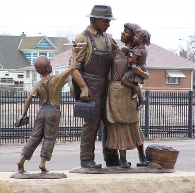 “A Prosperous Past, a Bright Future” by Fellow Gary Alsum and the National Sculptors' Guild was placed in Brighton, at Bridge St and Cabbage Ave, commissioned through the city of Brighton, Colorado.  ​The public artwork features two sculptural elements. The first element speaks to Brighton’s rich history and sense of family. The piece depicts a father, mother and young daughter. The father’s occupation is vague so that the viewer could see him as a farmer, a miner or any profession that made Brighton what it is today. On the ground next to the mother’s foot is a basket of vegetables, a nod to Brighton’s agricultural past and future. The second element connects to the city’s current boom and its continued success in the future. This sculpture depicts a young boy, playing with a train and a toy airplane. The train is symbolic of Brighton’s past. The airplane is symbolic of Brighton’s steady economic growth as a result of its proximity to DIA. Gary states that “The challenge of sculpture is depicting the movement and energy of a single moment.” Placing a great deal of focus on movement and grace, Gary’s sculptures pass on the freedom, joy and curiosity that children display on a daily basis. ​  NSG Public Art Placement #287