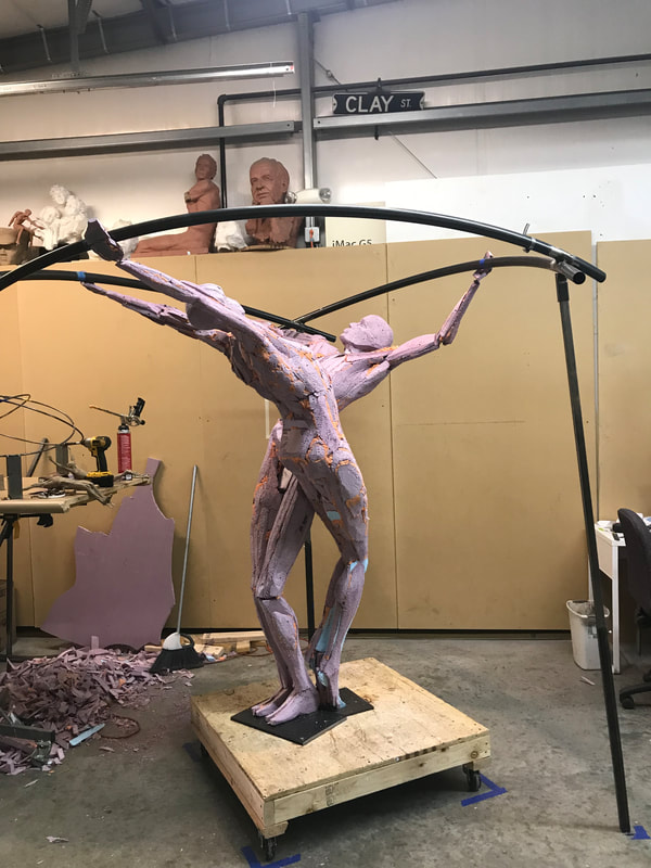 Coming soon to Downey, California...
​"Tree of Life" by Clay Enoch and the National Sculptors' Guild is in the finishing steps of bronze casting at Art Castings of Colorado.

This installation is part of a series of Public Art placements that the City has commissioned from the National Sculptors' Guild for installations in 2020. The bronze and stainless steel sculpture will be placed in a  the new fountain at the Theater Plaza.

Our design team began working on this project in March of 2019.

Measuring 12-feet tall and 14-feet in diameter, the tree composed of eight life-size bronze figures out stretched from a single column are united by the stainless steel rings they hold; this sculpture is among our most complex figurative monuments to date. We are so excited to see this significant art statement in place. We will update this post as soon as installation is set.

Progression of the project is shown below...