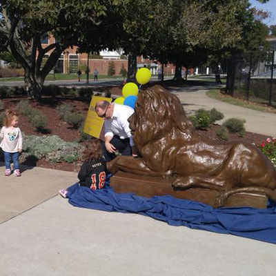 10/22/17: National Sculptors' Guild ﻿John Kinkade﻿ is in NJ for the unveiling of The College of New Jersey’s new Bronze mascot by NSG fellow #HerbMignery. The 8ft Lion served as the official greeter to homecoming fans at the game. The sculpture will be stored until the permanent site at the Brower Student Center is ready in Spring. The sculpture was generously presented to the school by alumnus William McLagan. #GoLions