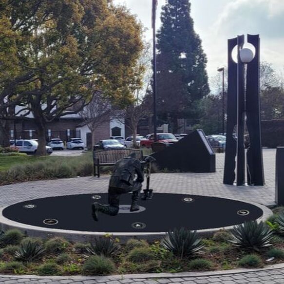 The National Sculptors' Guild is honored to have been selected by the City of Paramount, California to update their Armed Forces Plaza to include the new branches.   A life-sized kneeling soldier pays tribute at the foot of a Fallen Soldier cross. This bronze sculpture will be placed in the center of a circular plaza, facing in the direction of the Veteran's Memorial sculpture 