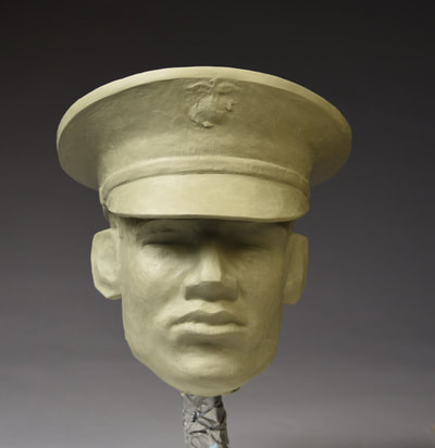 SALUTE by Clay Enoch and the National Sculptors' Guild Update 8/8/18: Clay has been hard at work sculpting the final portraits representing the five branches. two will be sculpted in the wax stage prior to casting. The objective was to create racially ambiguous male and female portraits for optimum inclusiveness of all service men and women. 