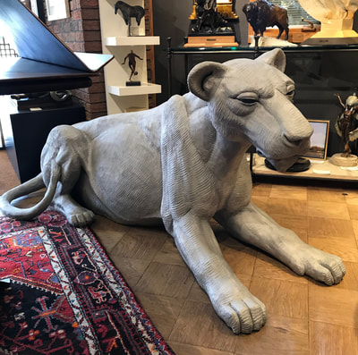 Update 11/1/18: ​Yes, that’s a lioness in the gallery!
​
We have National Sculptors' Guild Fellow Darrell Davis’ monumental sculpture here temporarily as we wait for the site and the other two pieces to be cast. We didn’t have a stone to anchor her on in the NSG sculpture garden, so, here she is visiting Columbine Gallery

Part of our public art projects, Davis’ “Lion Pride” will be installed in the roundabout as you enter the Little Rock Zoo soon. We love this first lion. She’s a big beauty!