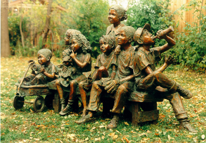 National Sculptors' Guild public art placement 6 Snapshot by Jane DeDecker in Lakewood, Colorado 1994. "Snapshot" by Jane Dedecker and the National Sculptors' Guild was placed in Lakewood's Addenbrooke Park in 1994.   ​Snapshot was originally commissioned by Michael Jackson, The multi-figure bronze depicts a number of children ready for the camera, sitting on a bench with a wagon pulled up to one side; the kids are in a casual pose, enjoying a respite from summer play, holding toys and drinking a soda. It even includes the pouting kid in the back - not wanting to be pictured as often happens. The piece is universal even though it was inspired by photos Jackson gave DeDecker.    NSG Public Art Placement 6. "The people of Lakewood have been walking past Michael Jackson and his pals for years -- without knowing it.  In Addenbrooke Park sits a lifesize sculpture by Loveland artist Jane DeDecker. Commissioned by Jackson in 1992 -- depicting Jackson as a young boy surrounded by his friends, also made younger for the piece, including Macaulay Culkin, Gary Coleman, his sister Janet Jackson, his niece Brandi Jackson and filmmaker friend Brett Ratner. The other children in the piece are friends of DeDecker’s.  DeDecker met Michael Jackson at an arts festival in Los Angeles in 1992. She had a booth on Santa Monica Boulevard, and he stopped to admire her work, but within 10 minutes they were surrounded by fans. Jackson fled but returned the next day in disguise, bought two pieces and visited with DeDecker for about an hour. It was after that that Jackson commissioned her to make “Snapshot,” a candid scene of Jackson and his friends. He sent her photographs for the piece, which she still has.  With a touch of whimsy, DeDecker put a baseball glove on young Jackson’s left hand, which, she says, delighted the King of Pop.  Jackson had the original bronze in his sculpture garden at Neverland. The one that sits in Lakewood is another casting from the edition purchased from the National Sculptors' Guild by the city of Lakewood in 1994  as the city's first piece of public art.  The city was unaware of the connection to Jackson at the time, says DeDecker, “I kept everything low-key, and I think he (Jackson) wanted it that way. He was just such a kind man. He loved my work and was always so supportive of me.” She says “Snapshot” isn’t so much about Jackson as it is about multiculturalism and youth. And that is still paramount," she says." - Denver Post, 2009