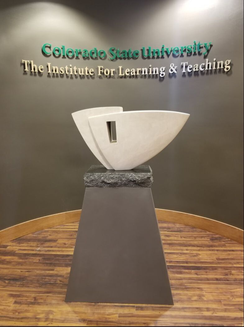 June 2018: Colorado State University has selected NSG Fellow Kathleen Caricof to create a sculpture honoring Alan Lamborn who retired from a 34-year career with CSU.  In designing the artwork, Caricof worked with the primary theme of the celebration of education, showing the importance of education as a foundation for the future. ​ The selected design, 